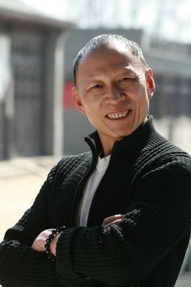 李周明