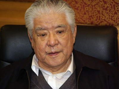 李默然